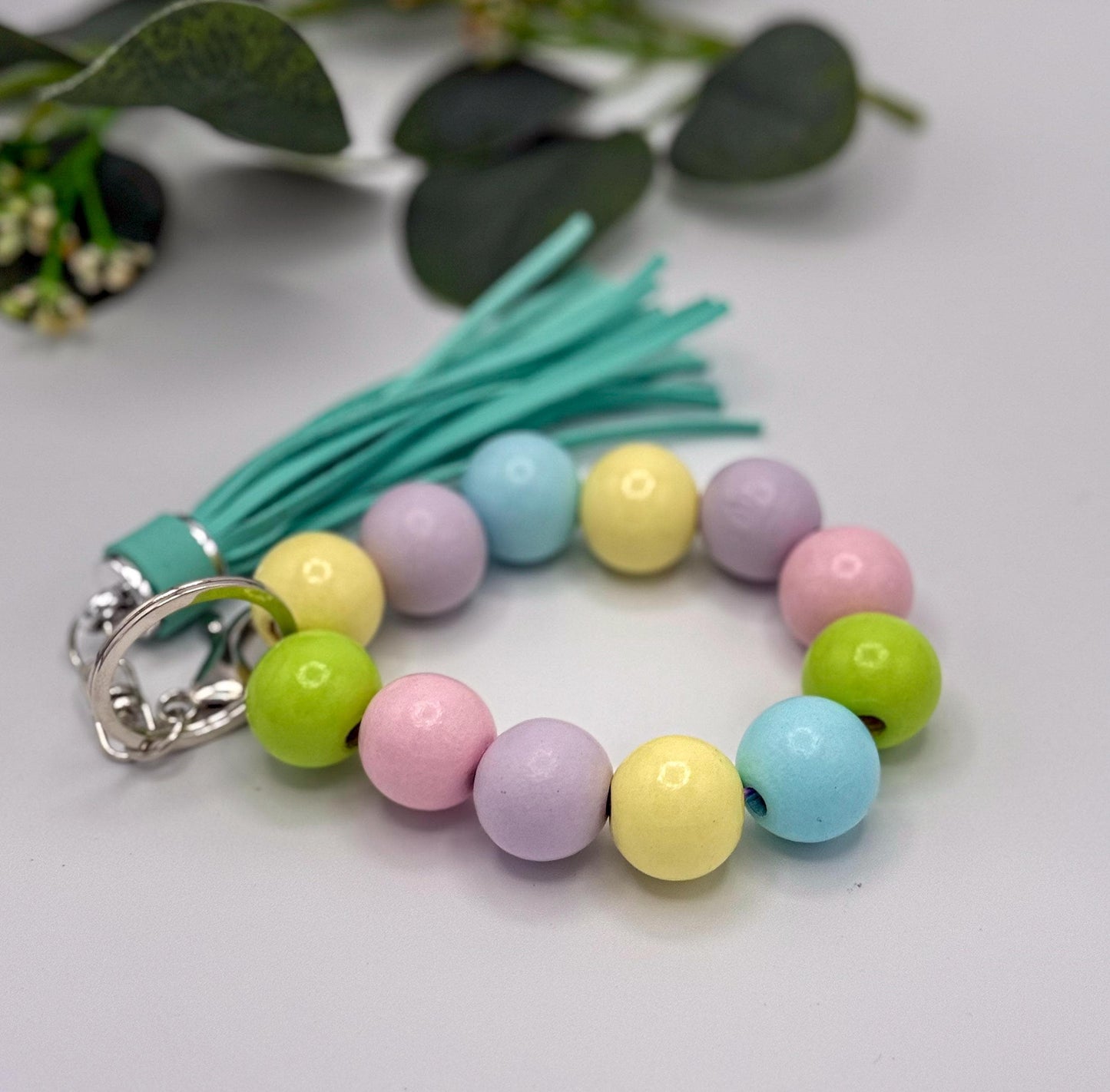 Pastel Charm Stretchy Wooden Bead Keychain with Tassel Flair