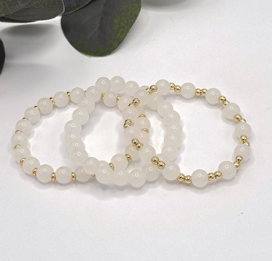 Casual Luxe: White Frosted Glass Bead Bracelet with Gold Spacers - Stretchy, No Clasp Design