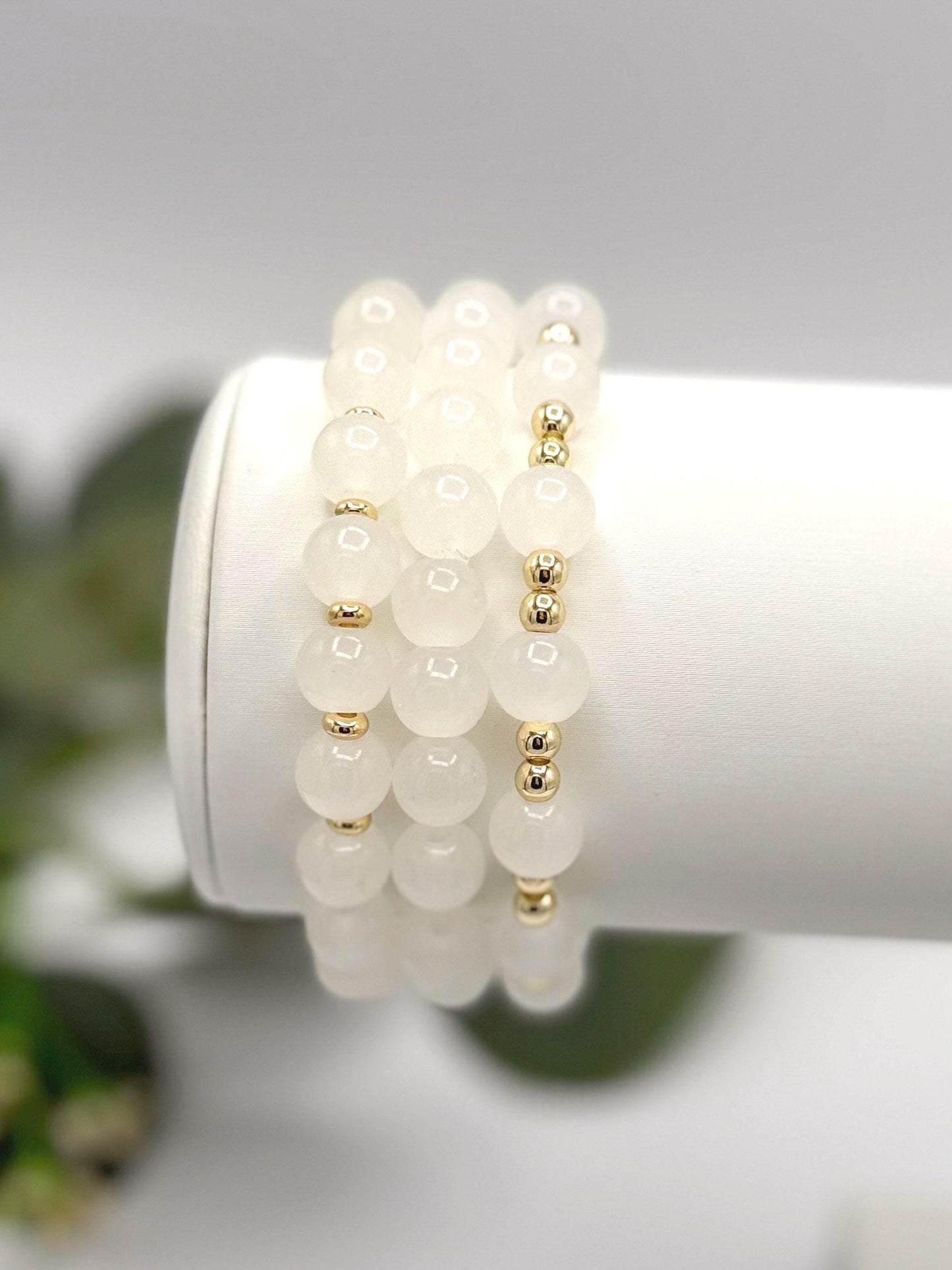 Casual Luxe: White Frosted Glass Bead Bracelet with Gold Spacers - Stretchy, No Clasp Design