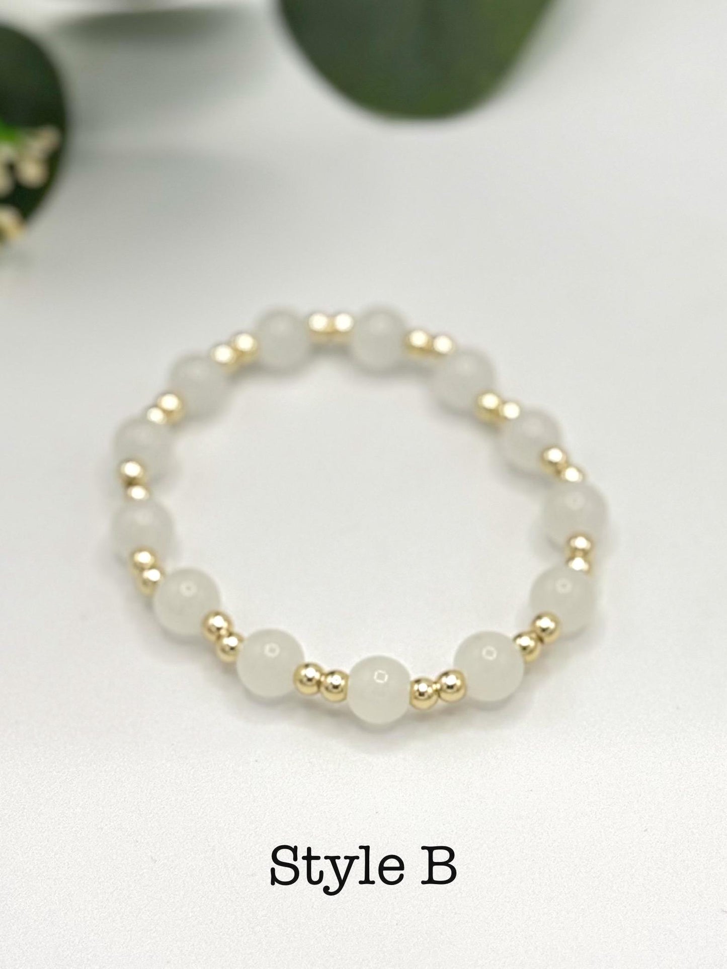 Casual Luxe: White Frosted Glass Bead Bracelet with Gold Spacers - Stretchy, No Clasp Design