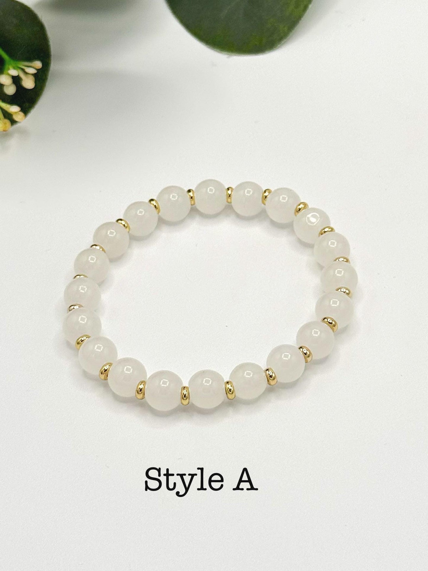 Casual Luxe: White Frosted Glass Bead Bracelet with Gold Spacers - Stretchy, No Clasp Design