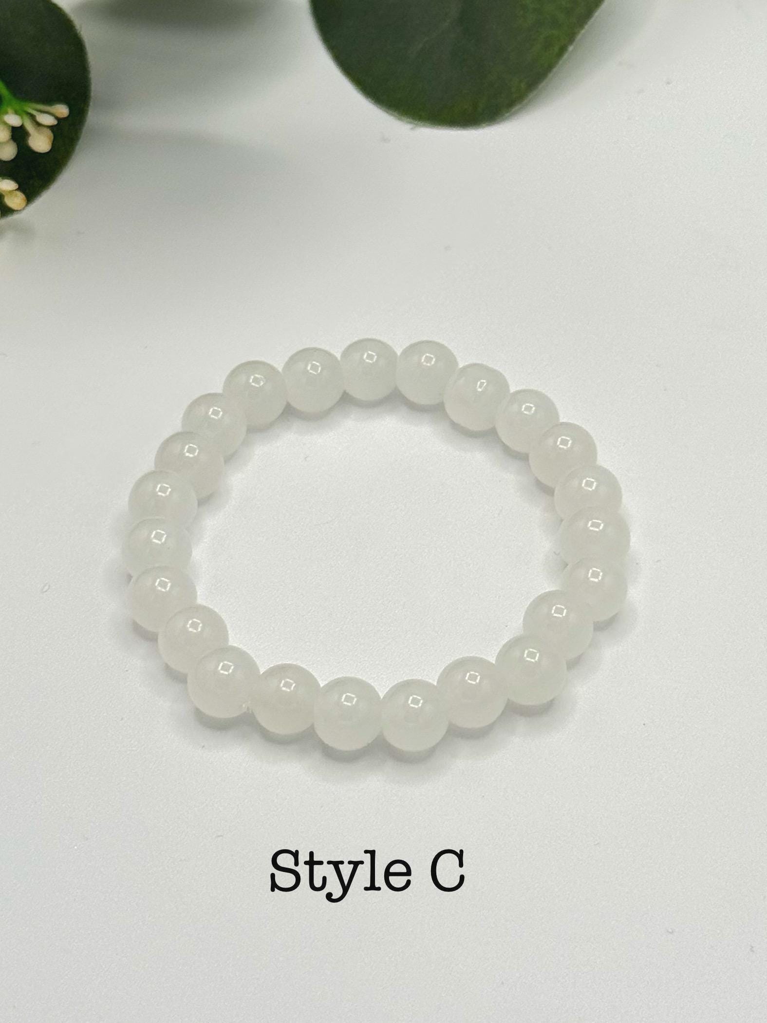 Casual Luxe: White Frosted Glass Bead Bracelet with Gold Spacers - Stretchy, No Clasp Design