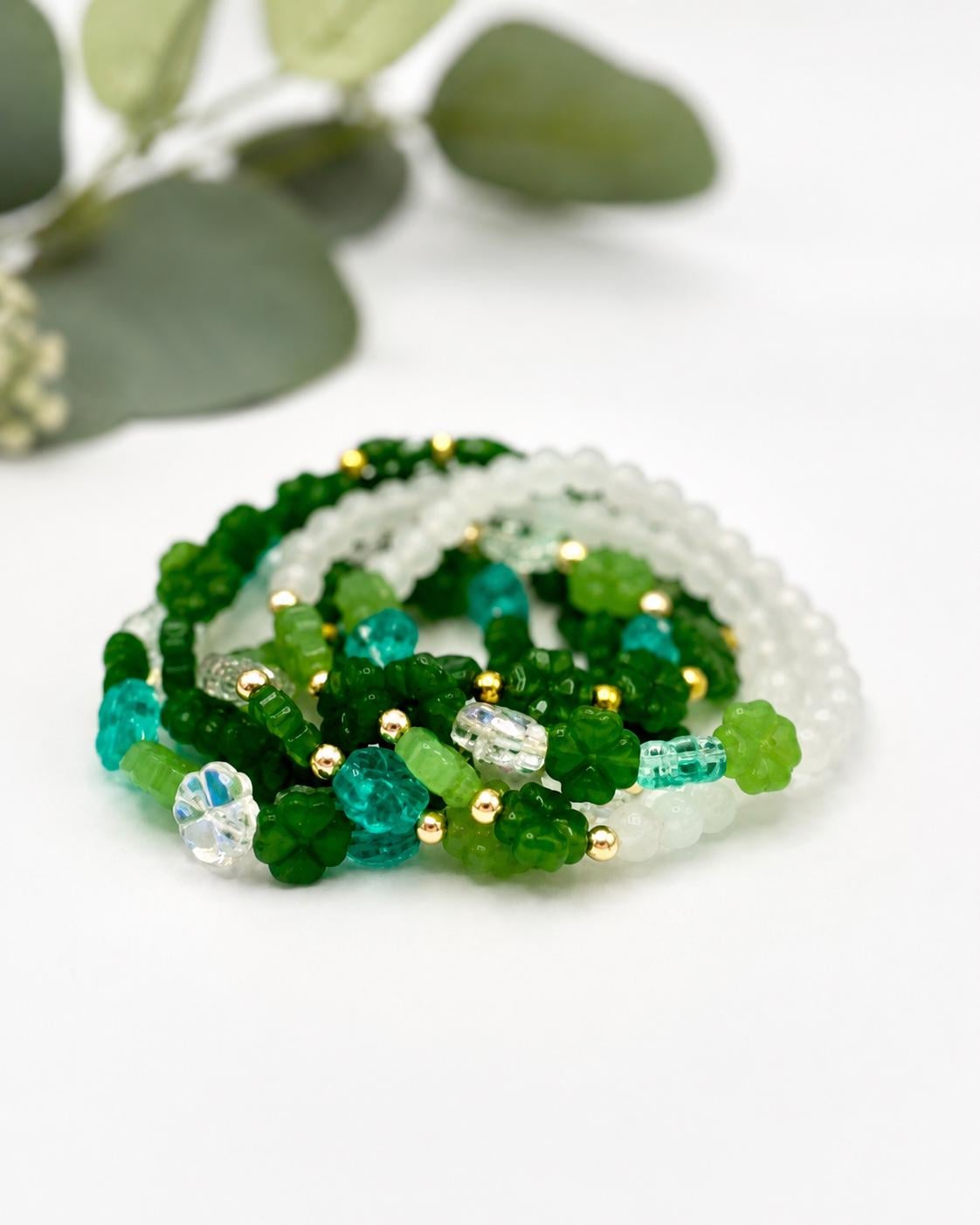 Lucky Charm: Green Glass Four Leaf Clover Bracelet - Stretchy, No Clasp Design