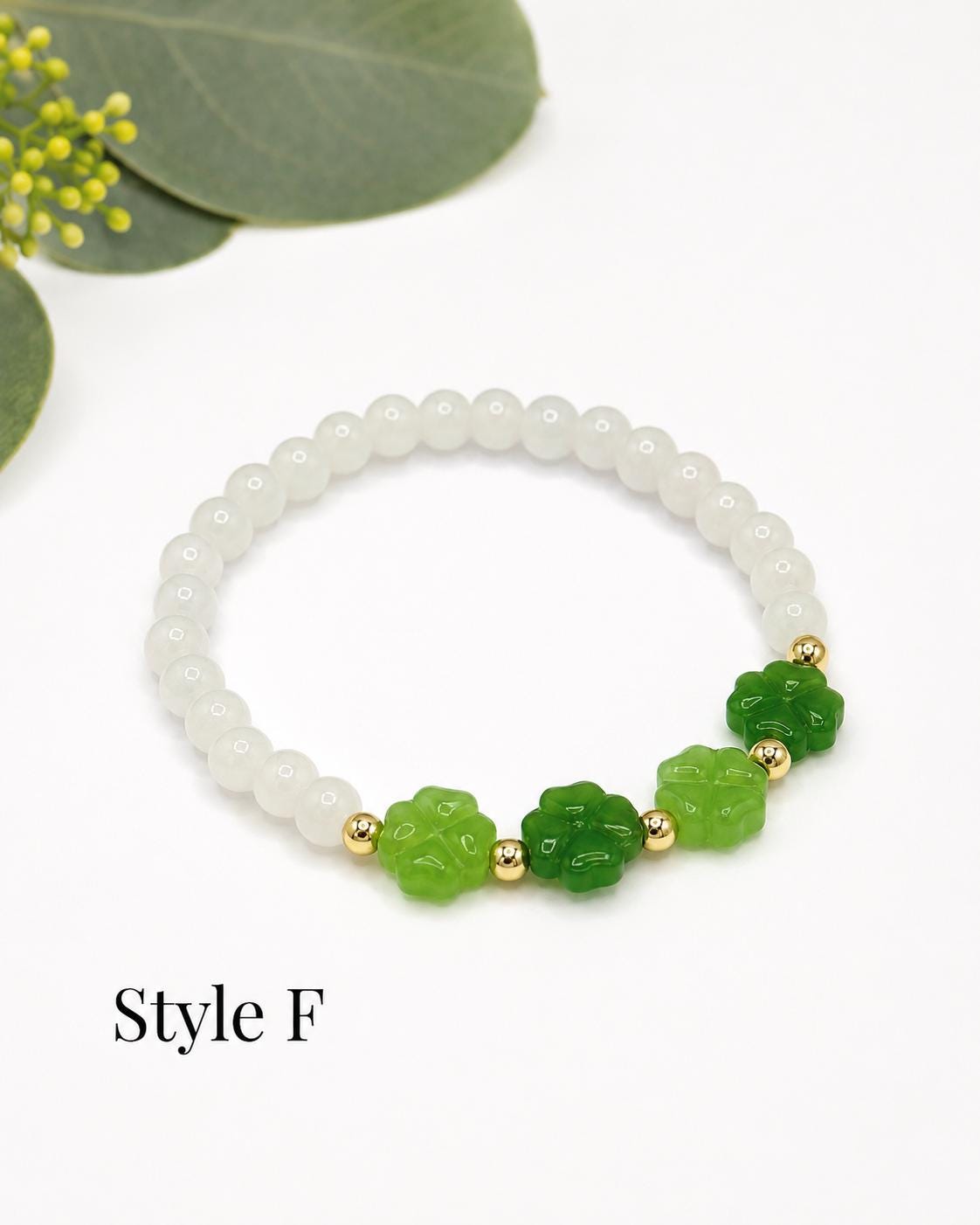Lucky Charm: Green Glass Four Leaf Clover Bracelet - Stretchy, No Clasp Design