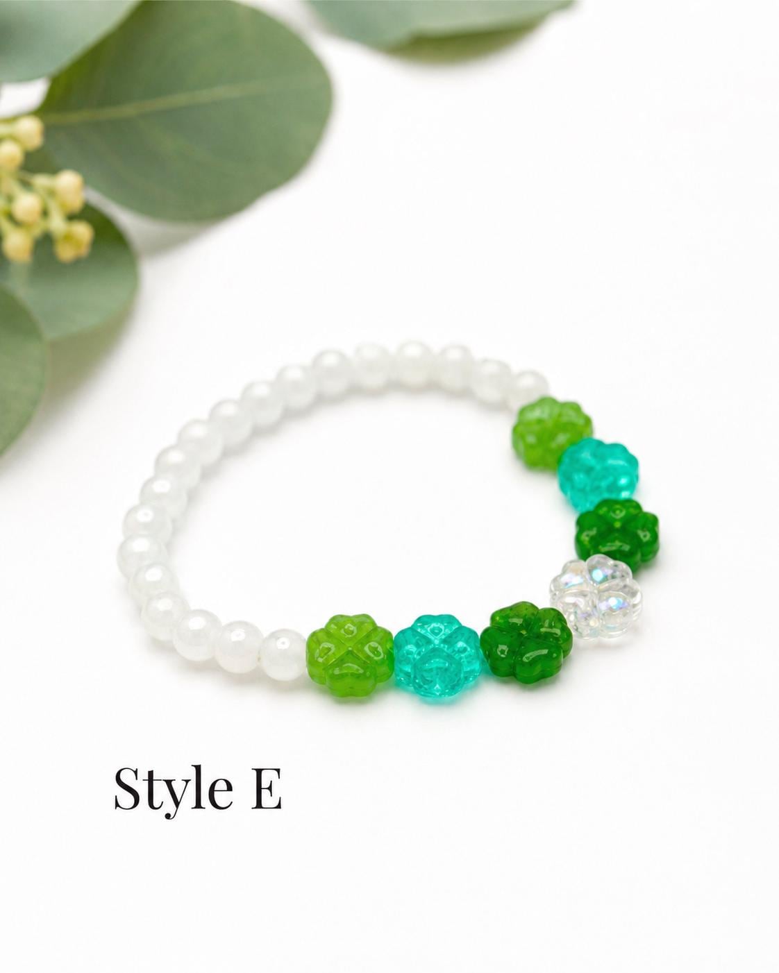 Lucky Charm: Green Glass Four Leaf Clover Bracelet - Stretchy, No Clasp Design