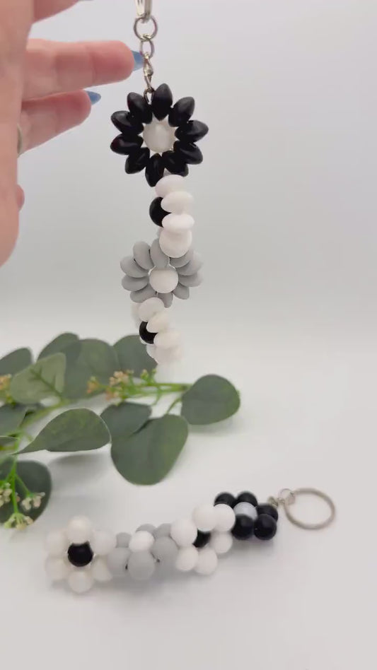 Modern Twist: Stylish Monochrome Flower Keychain